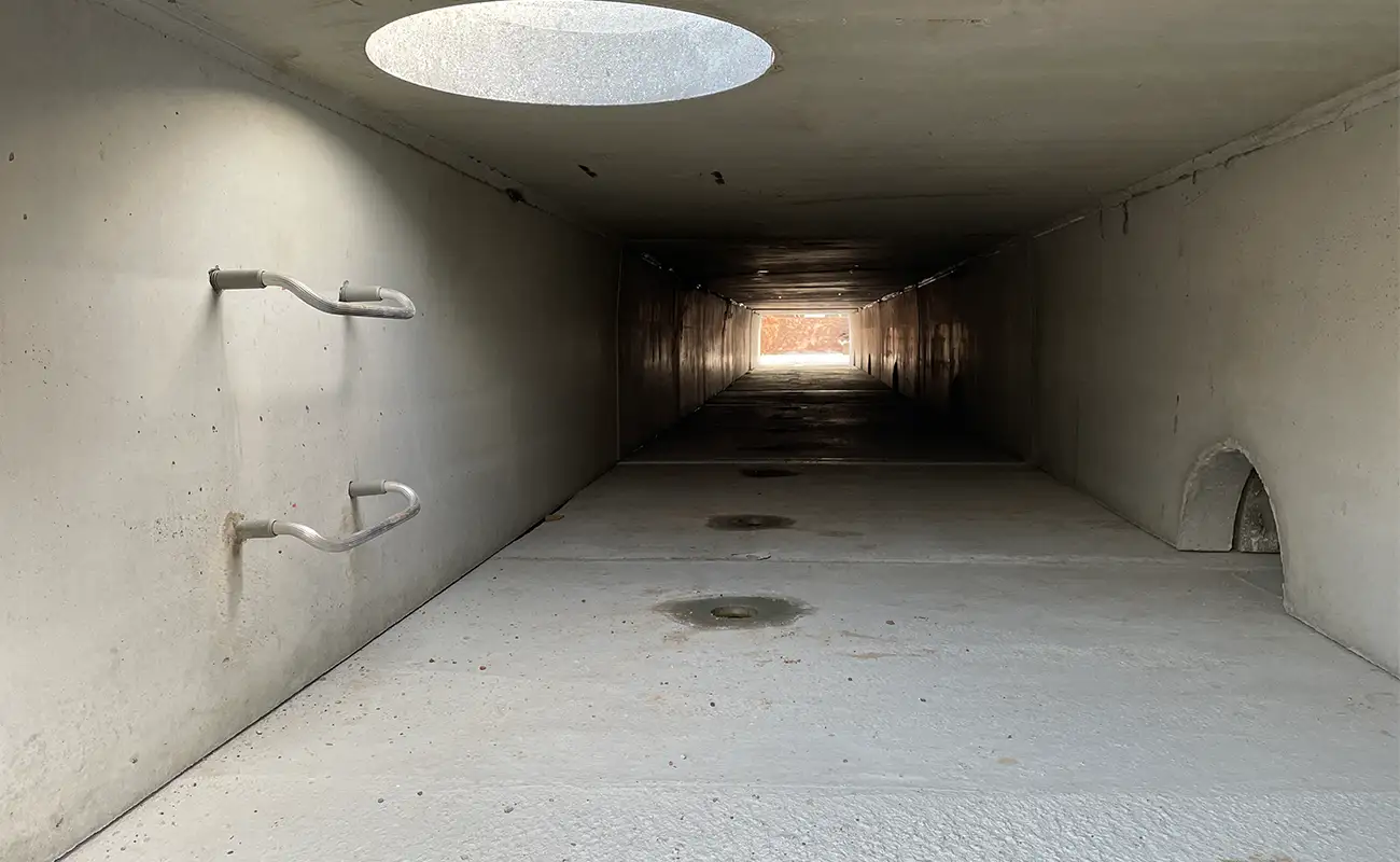 Interior view of StormTrap SingleTrap detention chamber at 4455 North Service Burlington Ontario showing access riser and connecting opening
