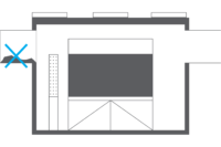 Diagram of a rectangular room with a large doorway, vents on top, and a blue X marking a side entrance on the left.